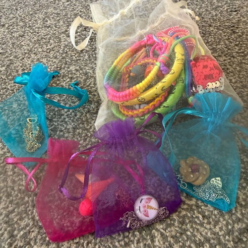 Children's jewelry used, colorful bracelets and pendants