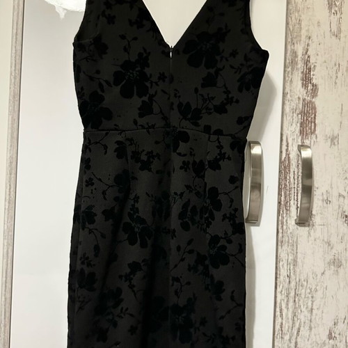Bellissima black dress new with embossed floral details, size M