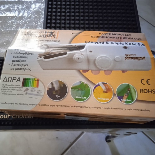 Mini handheld sewing machine used with all accessories