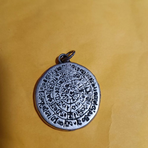 Phaistos Disc pendant silver like new, ancient emblem