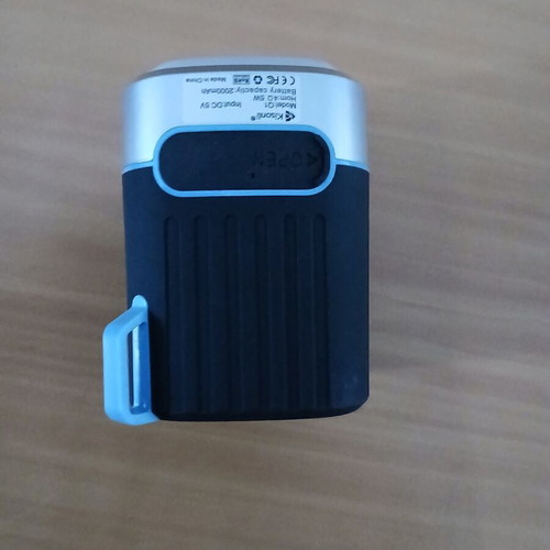Speaker with rechargeable flashlight used with microSD slot