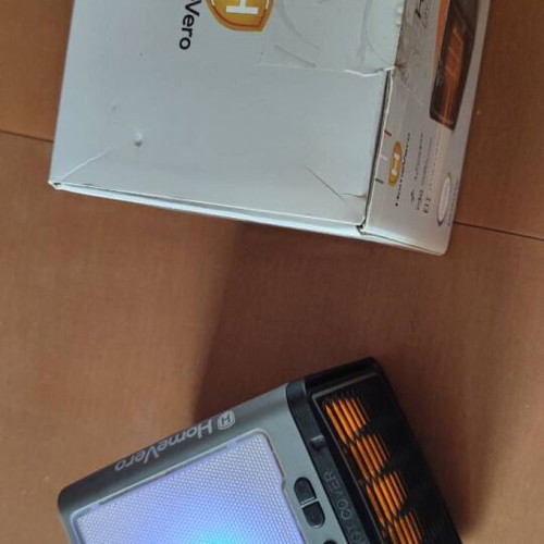 HomeVero HV-H1200 heater like new with 3 power levels and decorative light