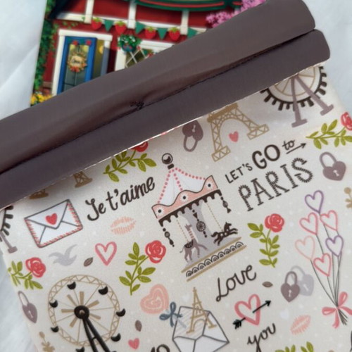 Handmade booksleeve with soft lining and button closure