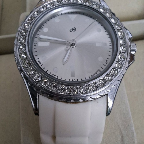 Women's silver-tone watch with crystals used