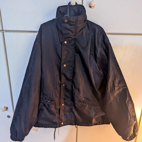 Waterproof windbreaker jacket with hood size M black like new