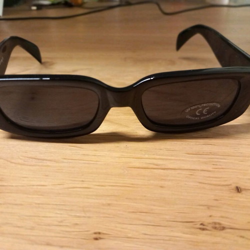 Black sunglasses in modern design new, Made in Italy