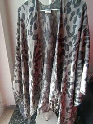 Animal print vest like new, black and grey