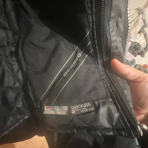Women's motorcycle jacket used with lining and protectors