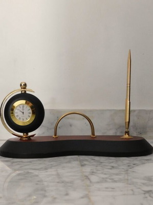 Desk set with analog clock, pen holder, and wooden base like new