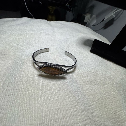 Adjustable bracelet like new, orange and silver