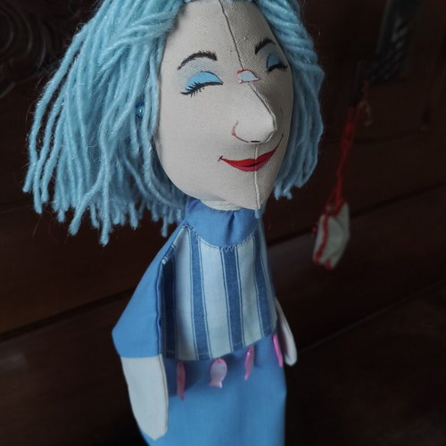Handmade doll for collectors or puppet theatre on wooden base