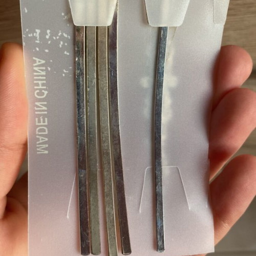 Hairpins used, silver shades with rhinestones