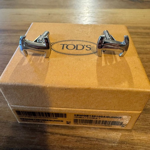 Tods cufflinks like new, silver color