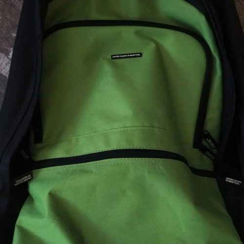 Benetton travel bag like new with multiple pockets and carrying options