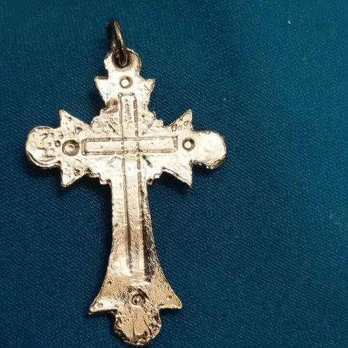 Vintage cross used, unknown material, silver color