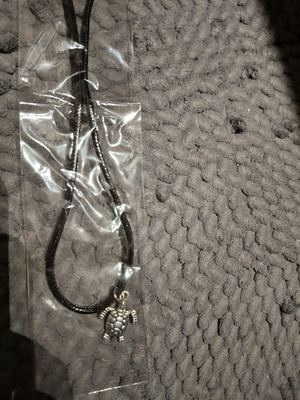 Turtle pendant new, unworn, black and silver