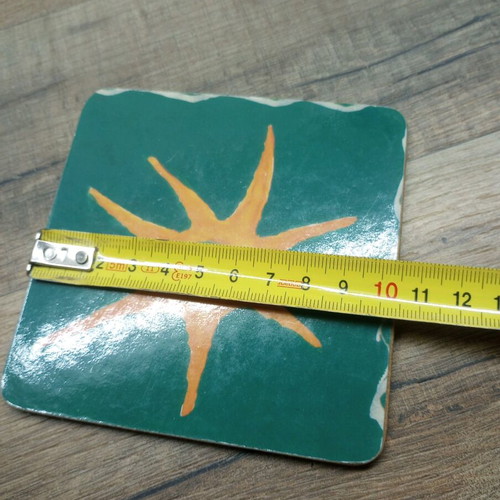 Coasters like new, set of 6 with cork base