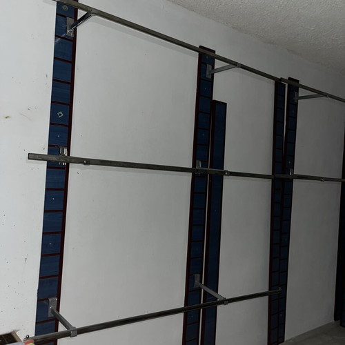 Professional Wall-Mounted Clothing Hanging System like new