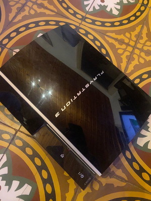 PlayStation 3 like new with remotes and cables