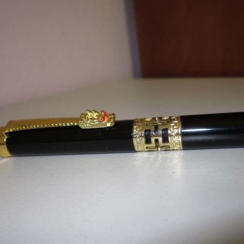 Pen new black ink with gold dragon design