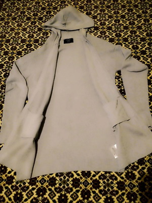 light gray jacket (color of a mug) with pockets and a hood