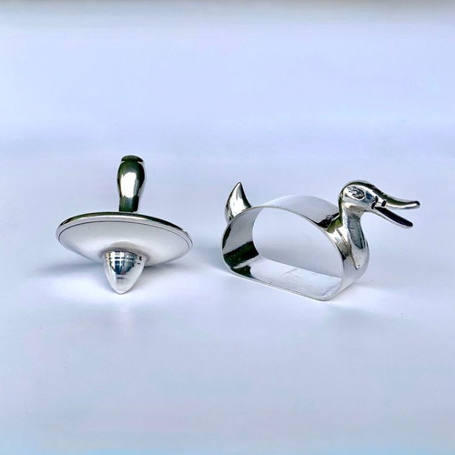 Set of 2 silver decorative items 900 & 925 used, duck and spinning top