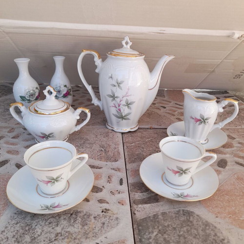 Porcelain tea set collectible with gold details and small vases like new