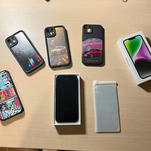 Apple iPhone 14 128GB Midnight with 4 cases and 4 screen protectors