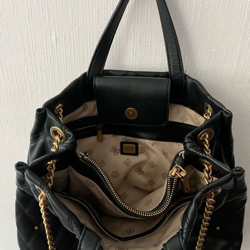Guess shoulder bag black and gold like new