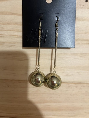Dangling earrings, gold color, new