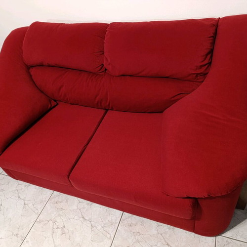 Two-seater waterproof sofa like new with removable cushions