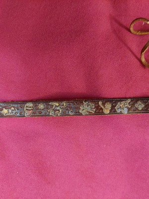 Leather children's bracelet used brown tied with cord