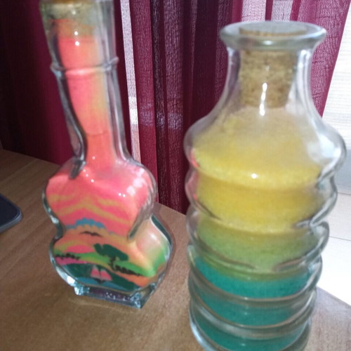 Glass decorative containers with artistic details