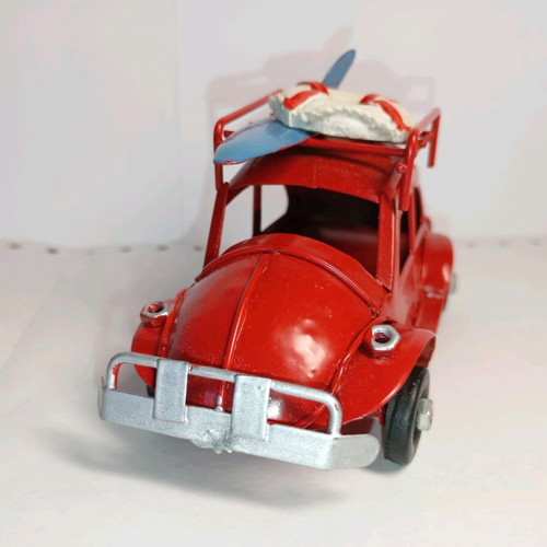 Red metal Scarab used