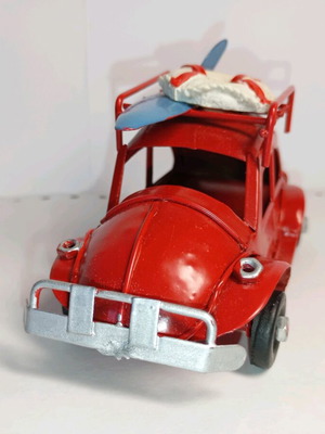 Red metal Scarab used