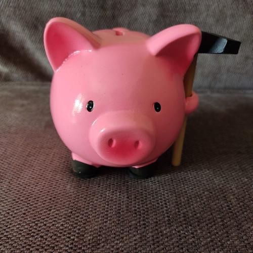 Ceramic piggy bank with hammer like new