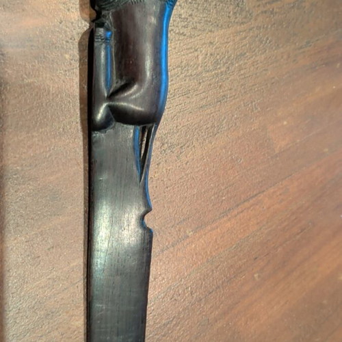 Wooden paper cutter used with handmade African art carving