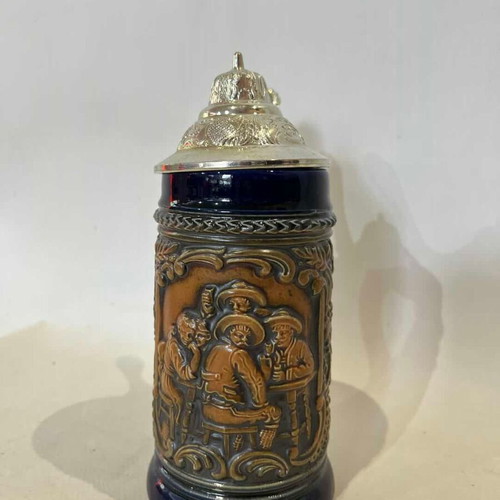 Gerz German beer stein used with embossed designs and pewter lid