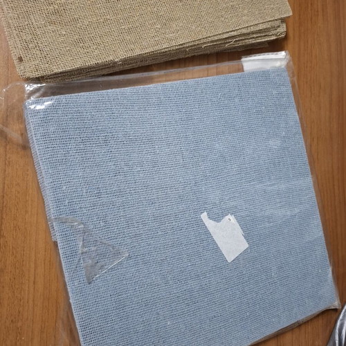 Set of 2 gauze packs in white and blue colors, new