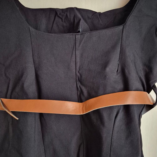 Black fitted top with belt new, sizes S and M