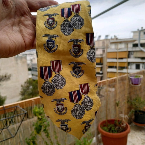 Emiliani silk tie used, multicolored with medal pattern