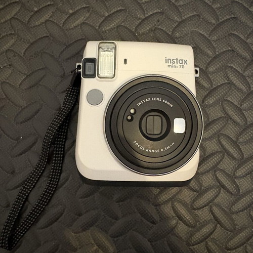 Instax Mini 70 Camera like new with box and extra films