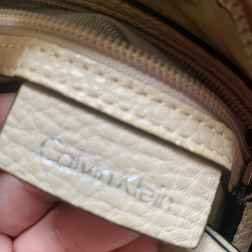 Calvin Klein crossbody bag used, beige with embossed logo