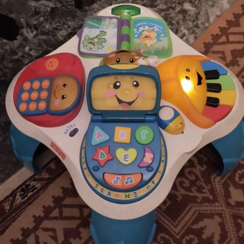 Fischer Price baby toy used, educational table with batteries