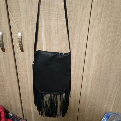 Women's leather crossbody bag with fringes nearly unused black