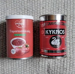 Empty tomato paste cans used for crafts