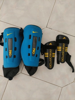 Nike L and Adidas S shin guards like new, 2 pairs