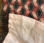 Handmade embroidered table runner with diamond pattern
