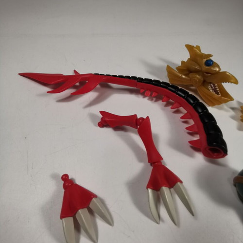 Yu-Gi-Oh! figures used Kazejin, Winged Dragon Ra, Slifer The Sky Dragon