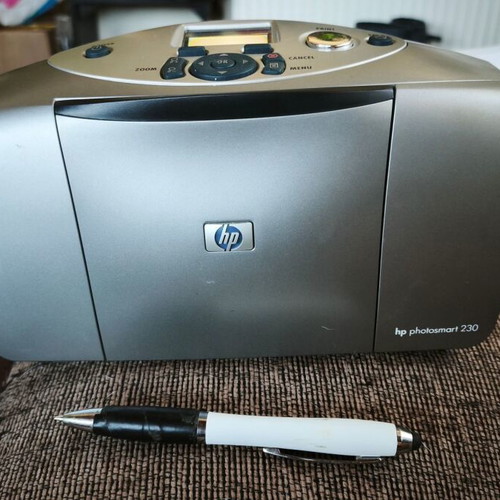 HP Photosmart 230 portable photo printer used